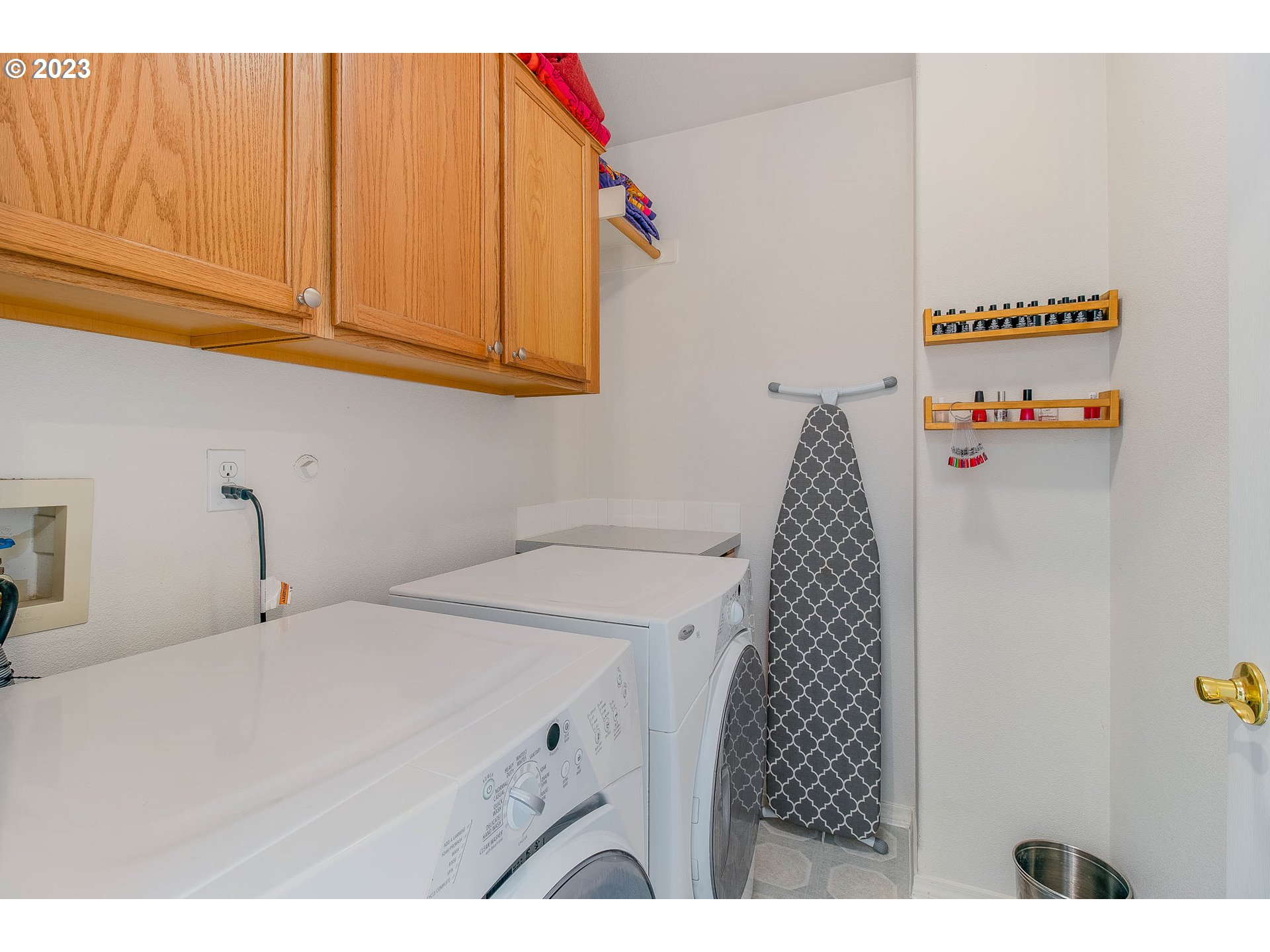 10335 Southwest Denney Road Beaverton, OR 97008 - Photo 25 of 31 a utility room with dryer and washer
