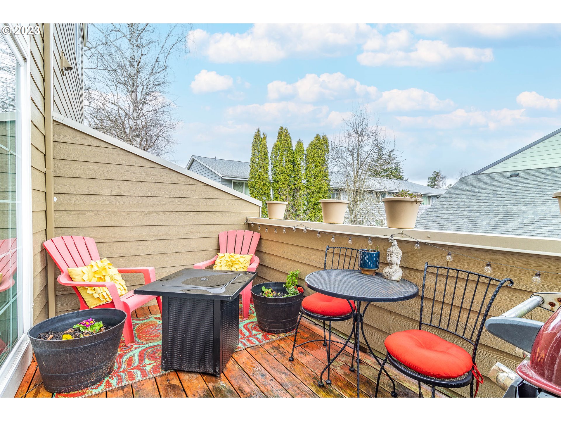 10335 Southwest Denney Road Beaverton, OR 97008 - Photo 9 of 31 a view of a chairs and table in patio