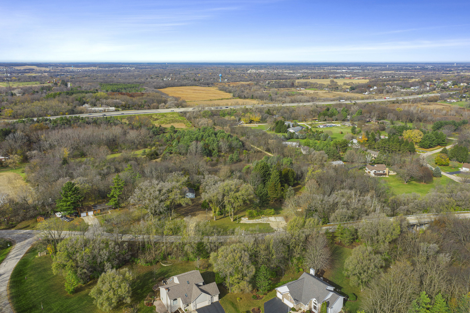 10182 Hamborg Road Roscoe, IL 61073 - Photo 4 of 23 a view of a city with mountains in the background