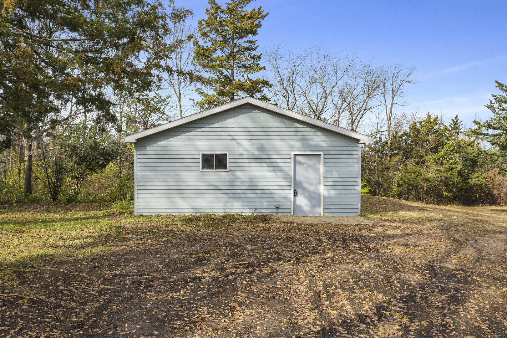 10182 Hamborg Road Roscoe, IL 61073 - Photo 9 of 23 a house with a yard