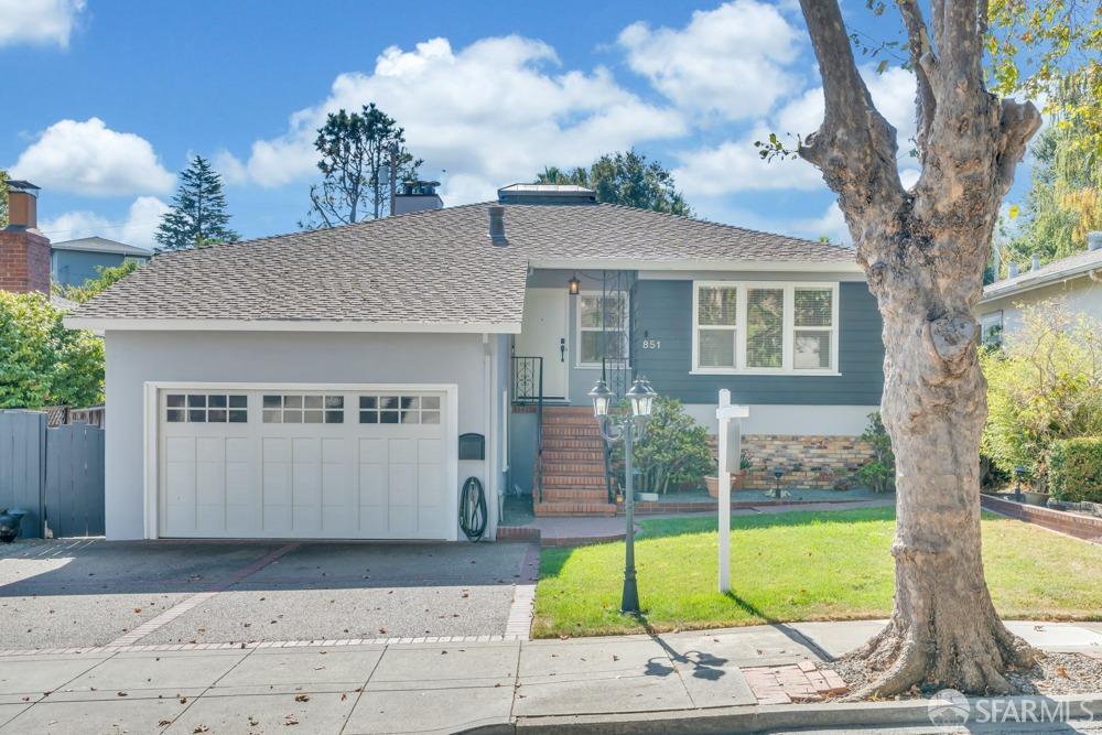 851 Taylor Boulevard Millbrae, CA 94030 - Photo 1 of 1 a view of a white house with a large tree and a yard