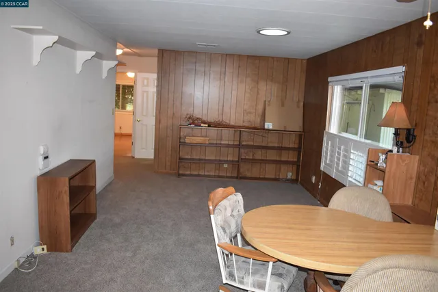 a view of a livingroom with furniture
