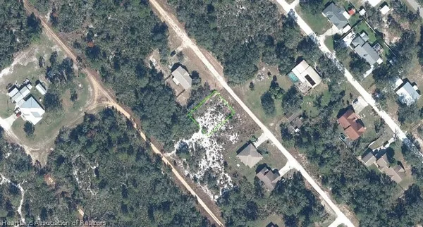 a view of a house with a tree