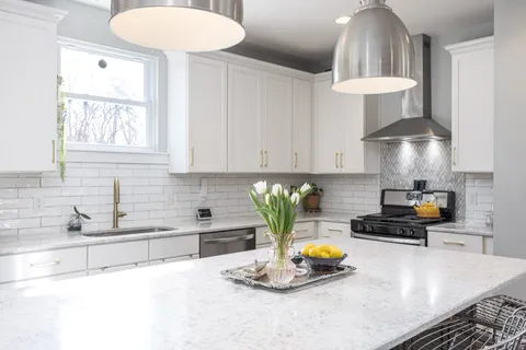 a backyard of a house with yard and outdoor seating