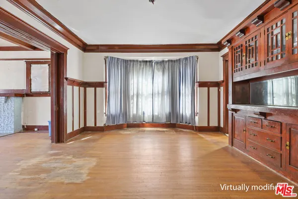 wooden floor and closet in a room