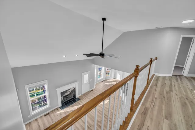 a view of entryway with wooden floor