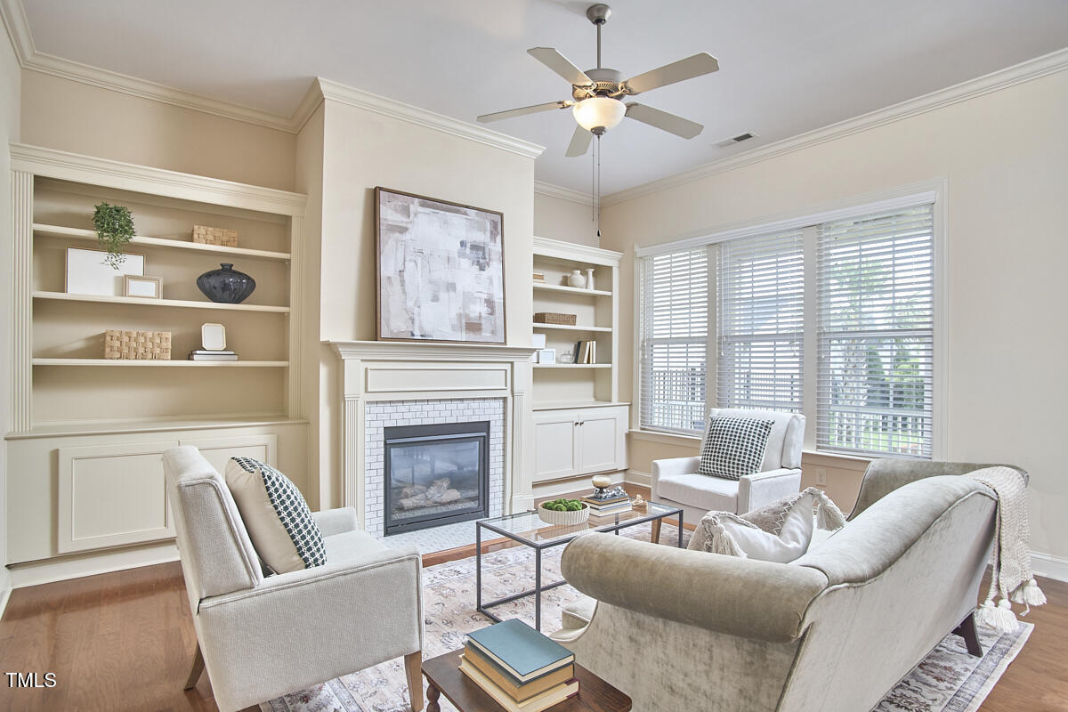 808 Historian Street Raleigh, NC 27603 - Photo 12 of 51 a living room with furniture fireplace and a large window