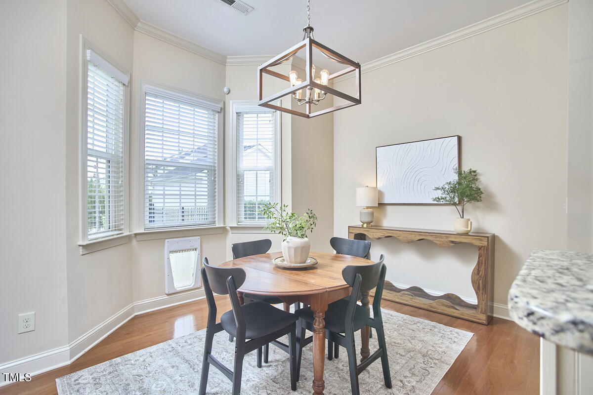 808 Historian Street Raleigh, NC 27603 - Photo 24 of 51 a view of a dining room with furniture window and outside view