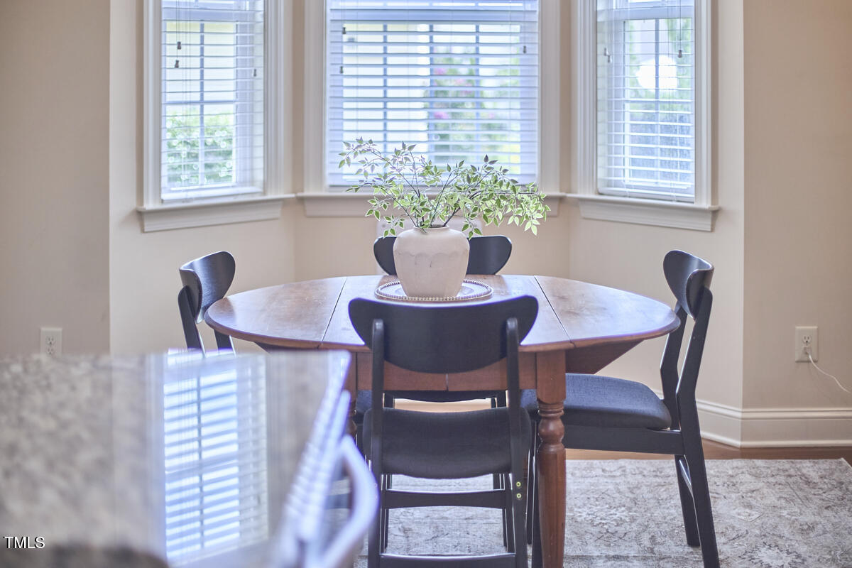 808 Historian Street Raleigh, NC 27603 - Photo 26 of 51 a dining room with furniture and window
