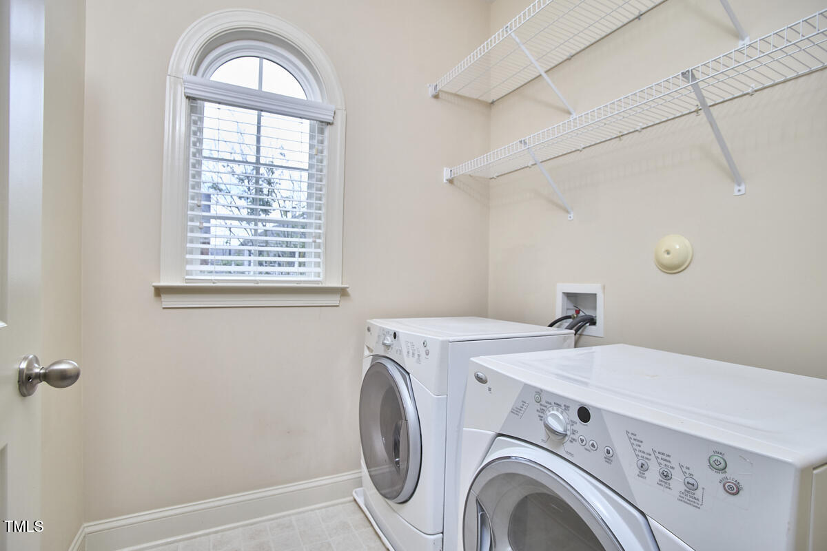 808 Historian Street Raleigh, NC 27603 - Photo 41 of 51 a utility room with dryer and washer