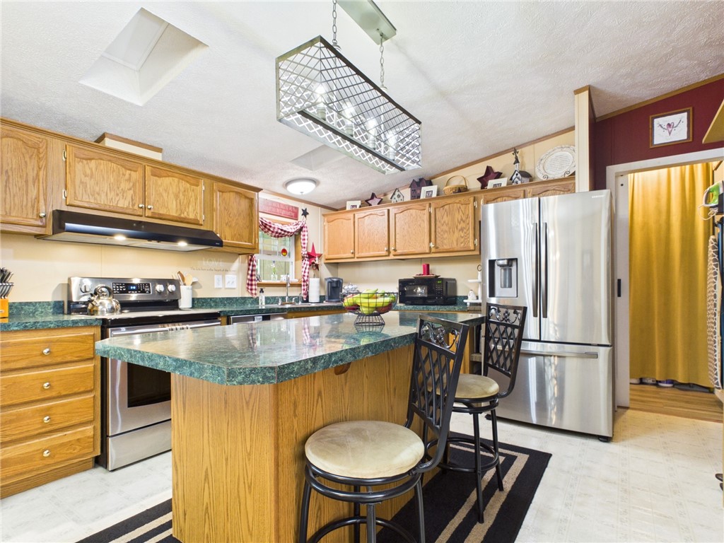 87 Collins Road Lewis Run, PA 16738 - Photo 2 of 48 Eat-in kitchen with access to main floor laundry a