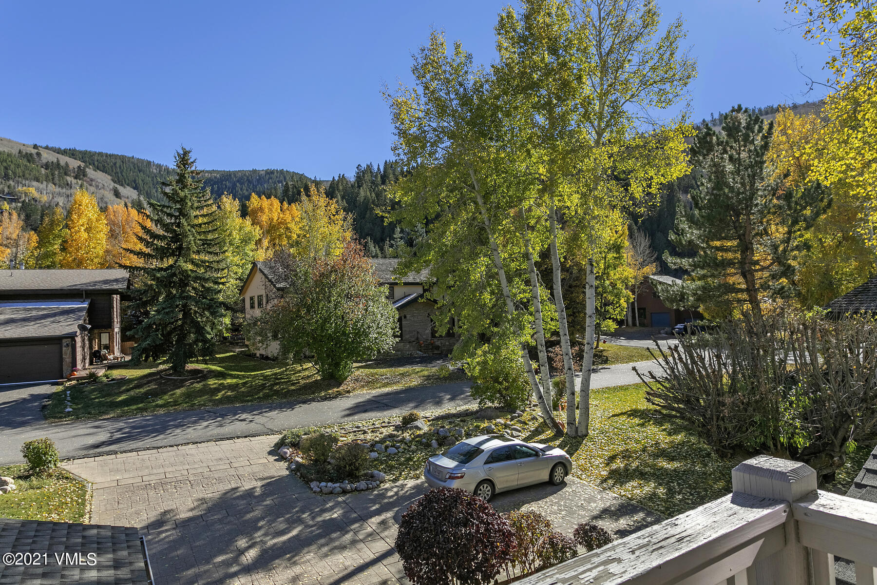 31 Beaver Road, Unit B Avon, CO 81620 - Photo 21 of 34 a view of a yard with plants and trees