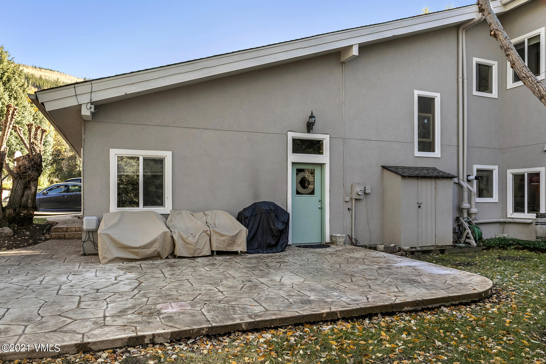 31 Beaver Road, Unit B Avon, CO 81620 - Photo 30 of 34 a front view of a house with patio