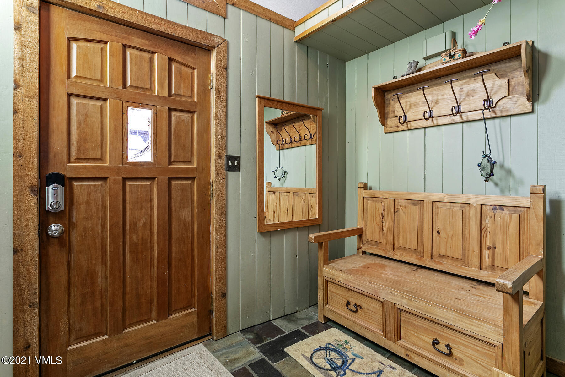 31 Beaver Road, Unit B Avon, CO 81620 - Photo 3 of 34 a view of an entryway with wooden floor