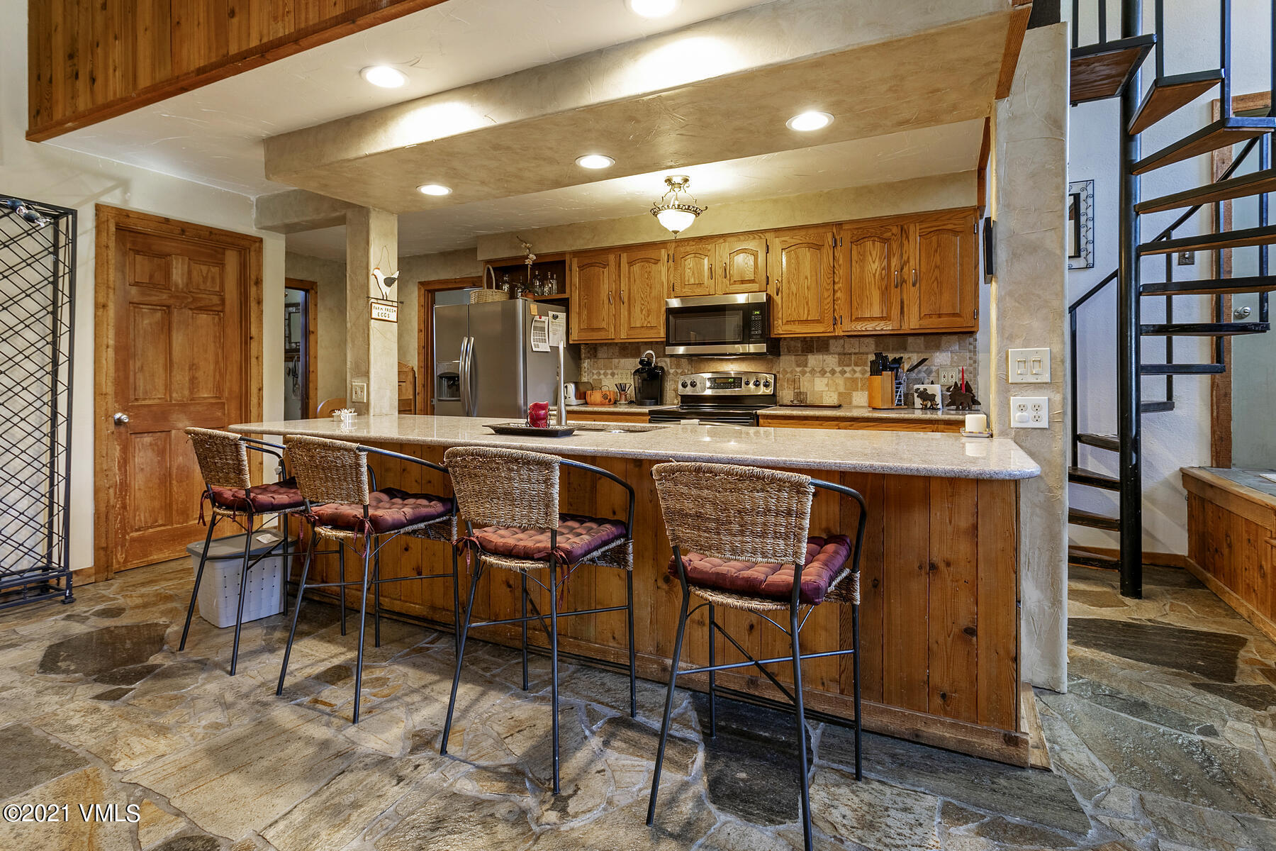 31 Beaver Road, Unit B Avon, CO 81620 - Photo 4 of 34 a view of a dining area with furniture