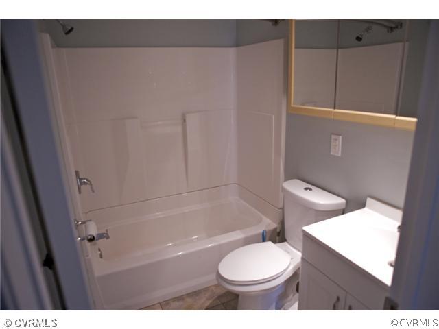 9103 Peaks Road Ashland, VA 23005 - Photo 8 of 12 a bathroom with a toilet and a sink