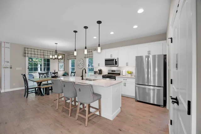 a kitchen with counter space cabinets and appliances
