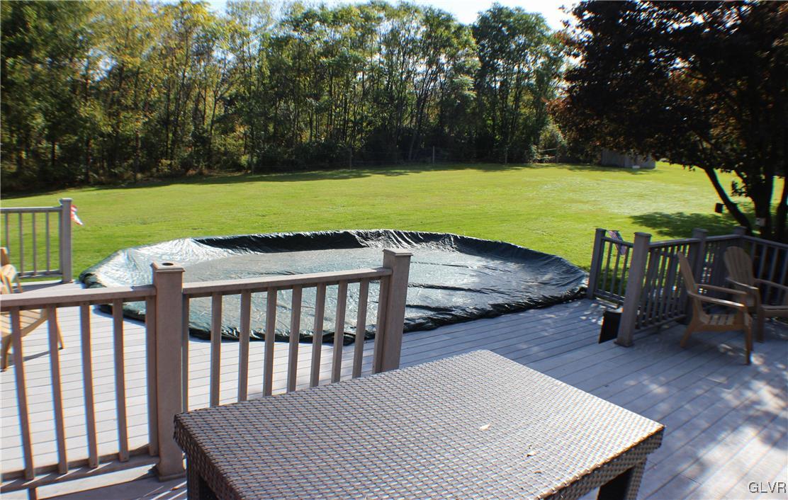 1967 Blue Barn Road Orefield, PA 18069 - Photo 9 of 35 a view of a chairs and table on the wooden deck