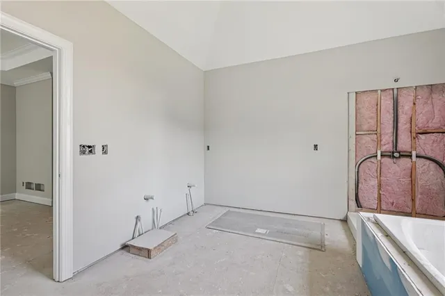 a view of a room with wooden walls