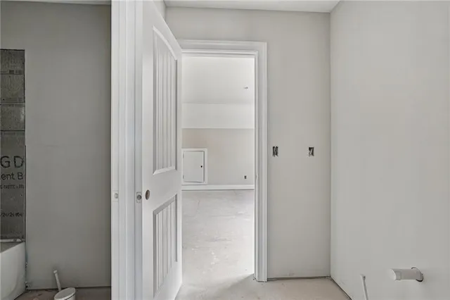 a front view of a house with a yard table and chairs