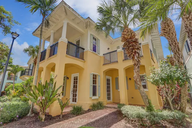 a view of a back yard from a corridor