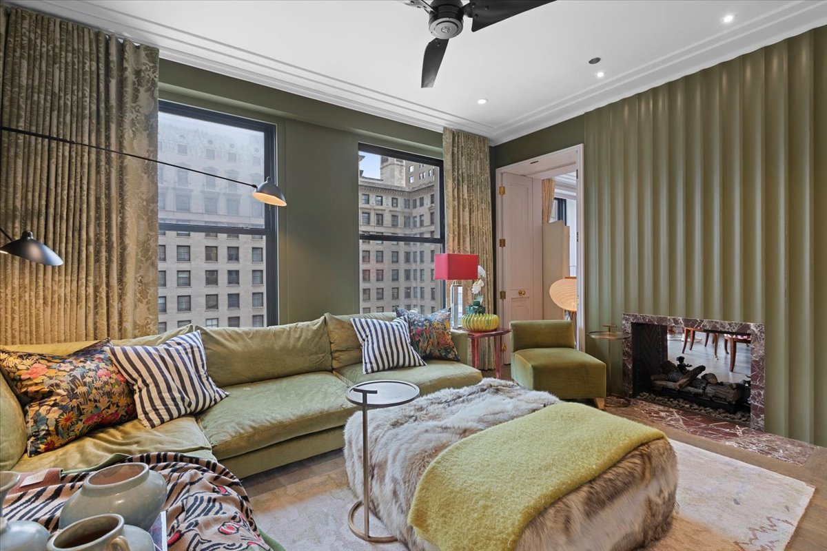 159 East Walton Place, Unit 8C Chicago, IL 60611 - Photo 16 of 28 a living room with furniture and a large window