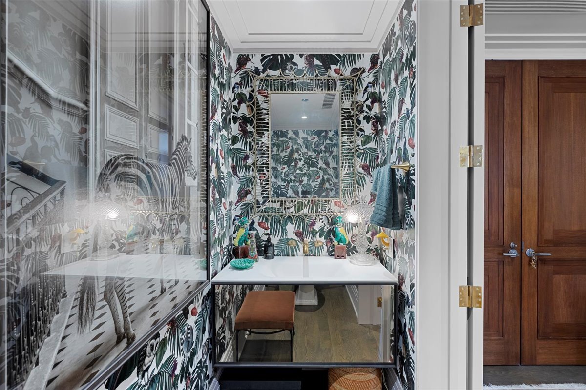 159 East Walton Place, Unit 8C Chicago, IL 60611 - Photo 18 of 28 a view of a dining room with furniture and chandelier