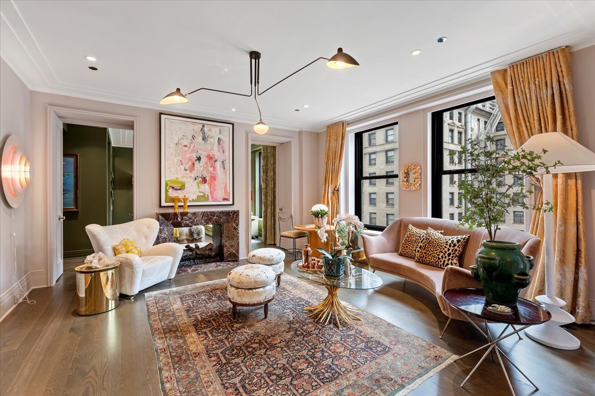 159 East Walton Place, Unit 8C Chicago, IL 60611 - Photo 21 of 28 a living room with patio furniture and a large window