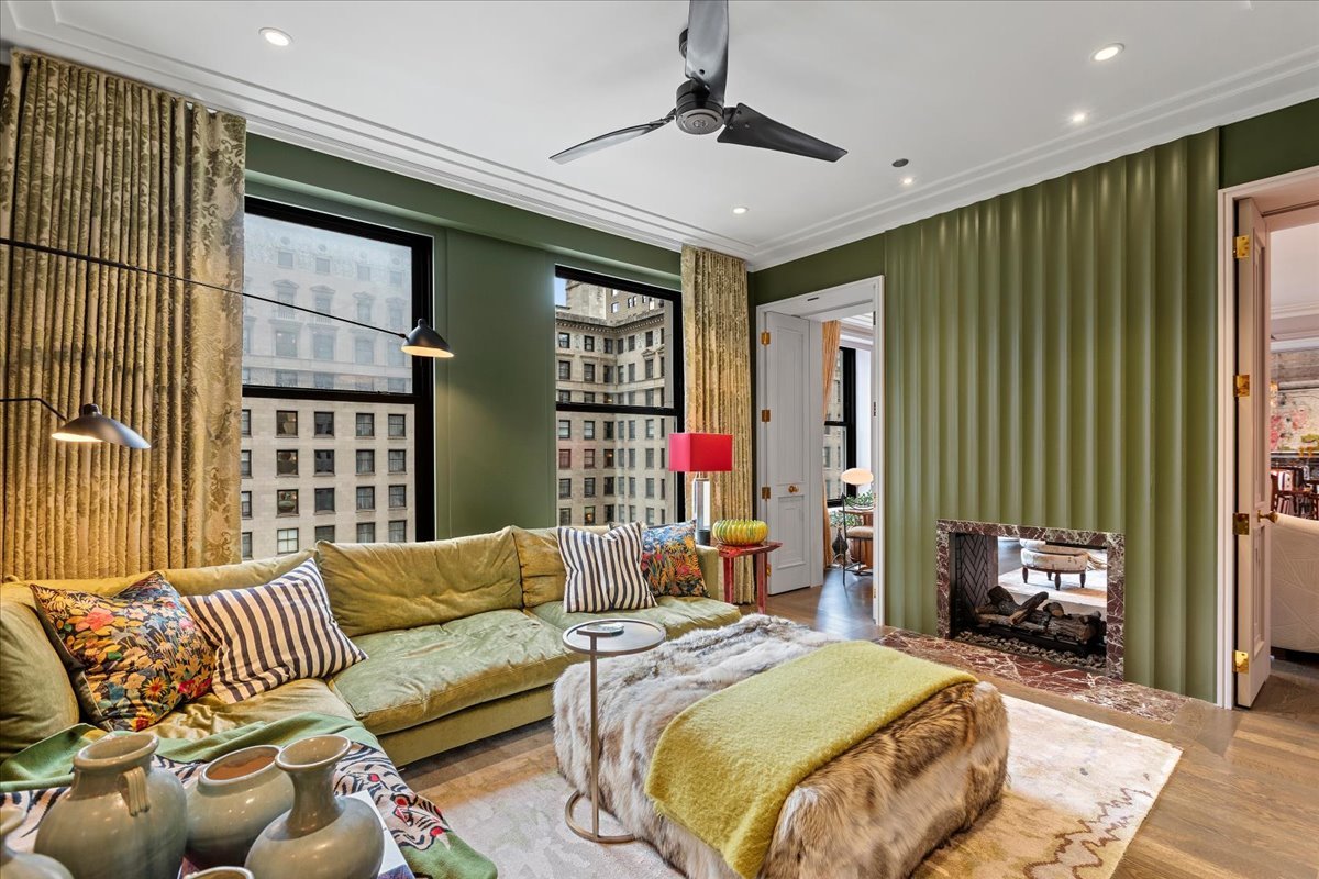 159 East Walton Place, Unit 8C Chicago, IL 60611 - Photo 25 of 28 a bedroom with a bed couch and a window