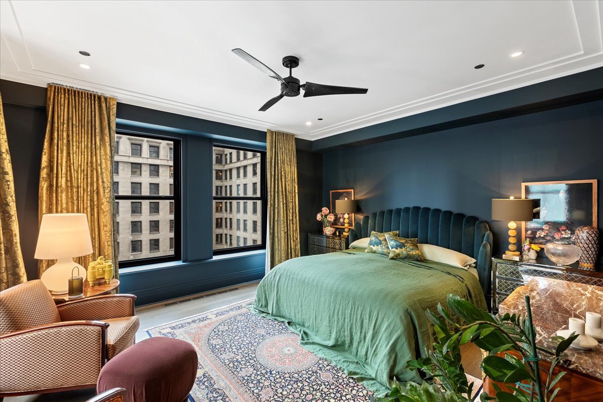 159 East Walton Place, Unit 8C Chicago, IL 60611 - Photo 9 of 28 a bedroom with a bed couch and a large window