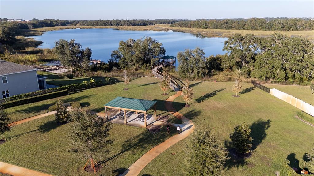 669 Jupiter Beach Road Groveland, FL 34736 - Photo 26 of 41 a view of a lake from a balcony