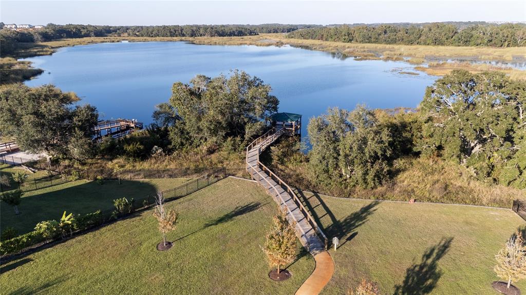 669 Jupiter Beach Road Groveland, FL 34736 - Photo 33 of 41 a view of a lake with outdoor space