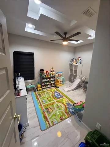 a bathroom with a sink a toilet a mirror and