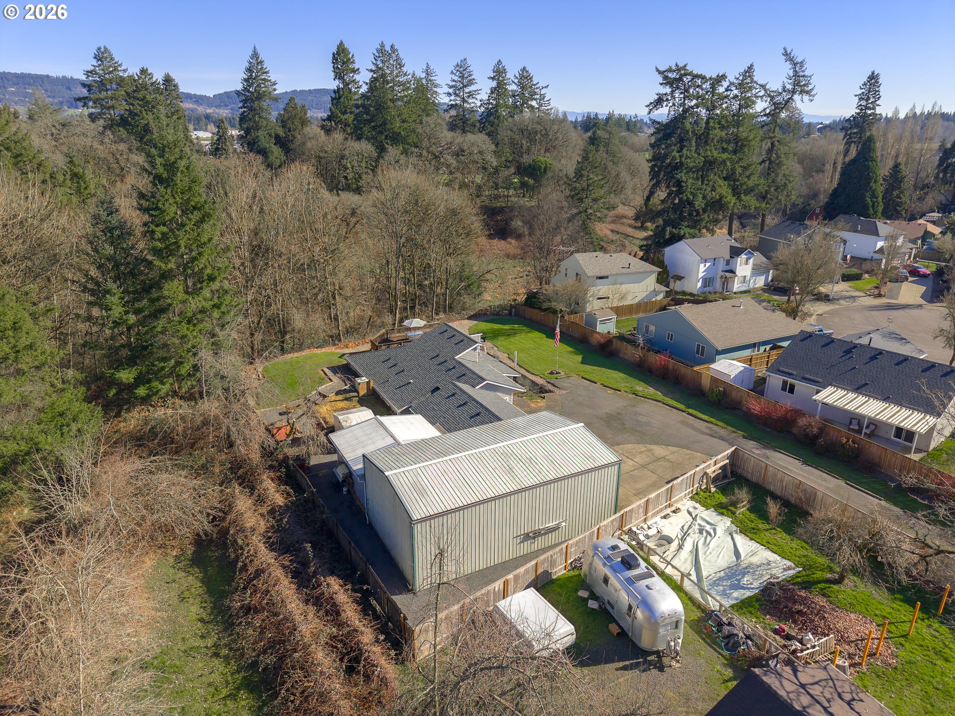 600 Wynooski Street Newberg, OR 97132 - Photo 15 of 48 a view of a house with a yard