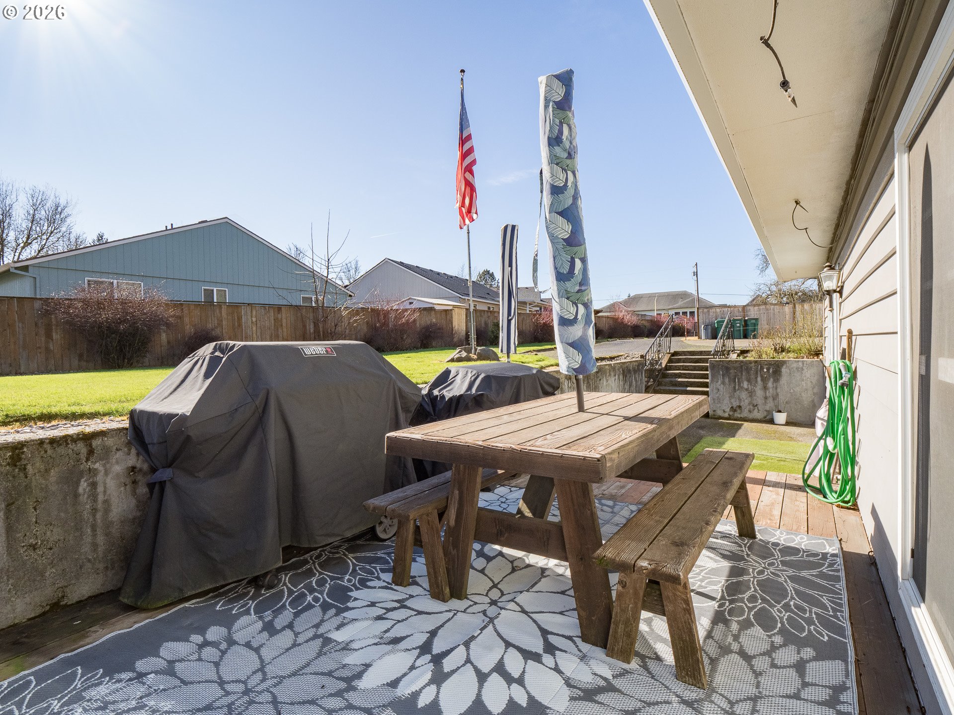 600 Wynooski Street Newberg, OR 97132 - Photo 21 of 48 a patio with table and chairs