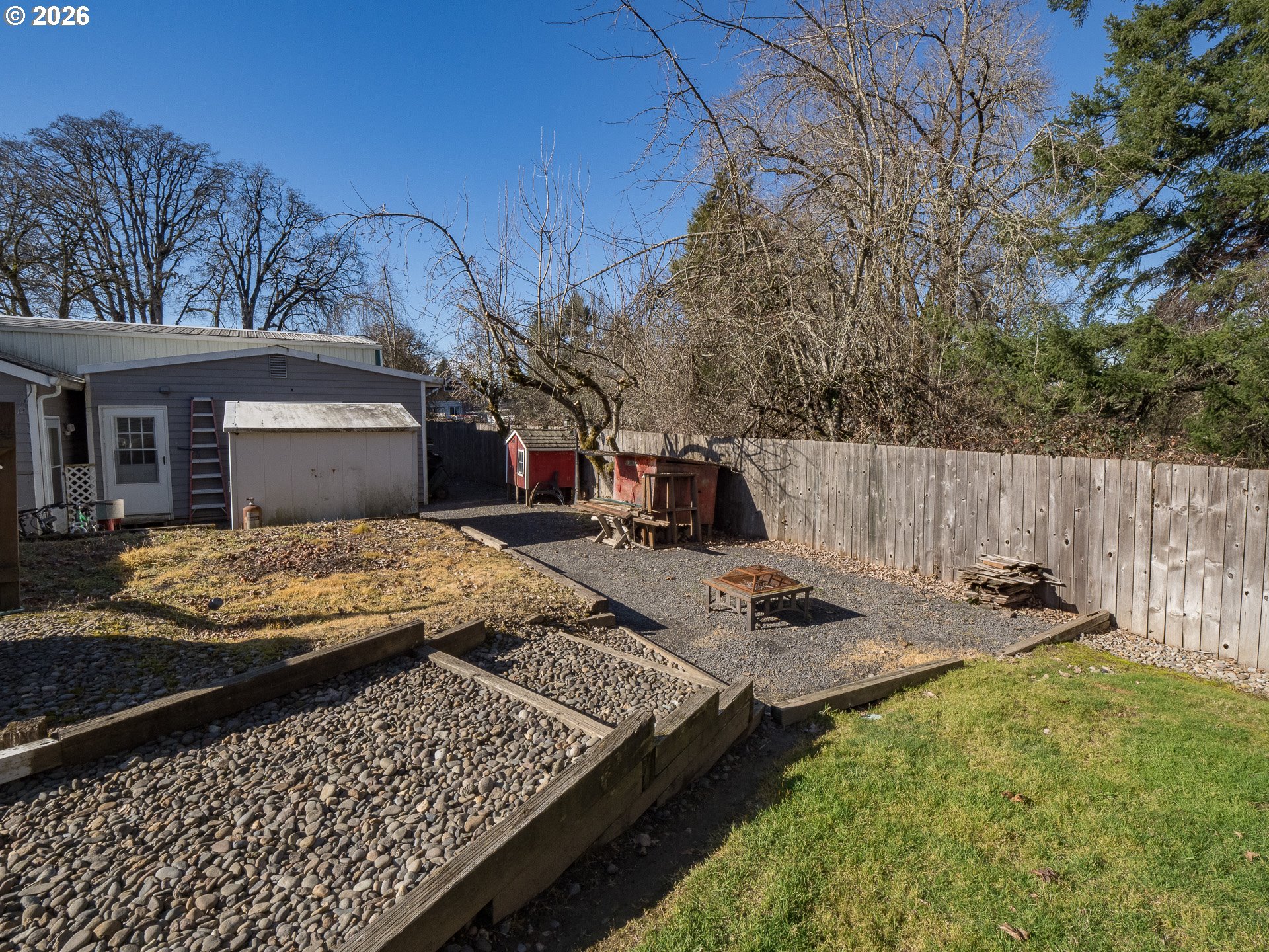 600 Wynooski Street Newberg, OR 97132 - Photo 38 of 48 a backyard of a house with table and chairs