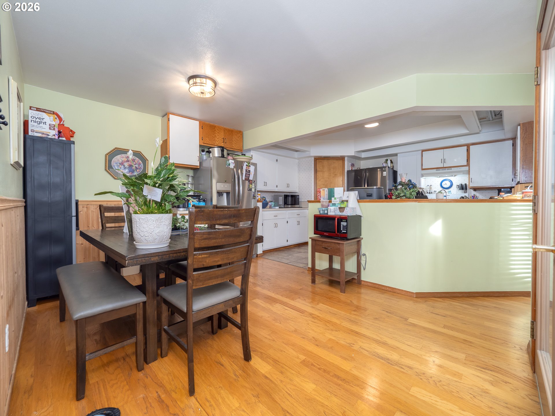 600 Wynooski Street Newberg, OR 97132 - Photo 43 of 48 a dining room with furniture and a kitchen view