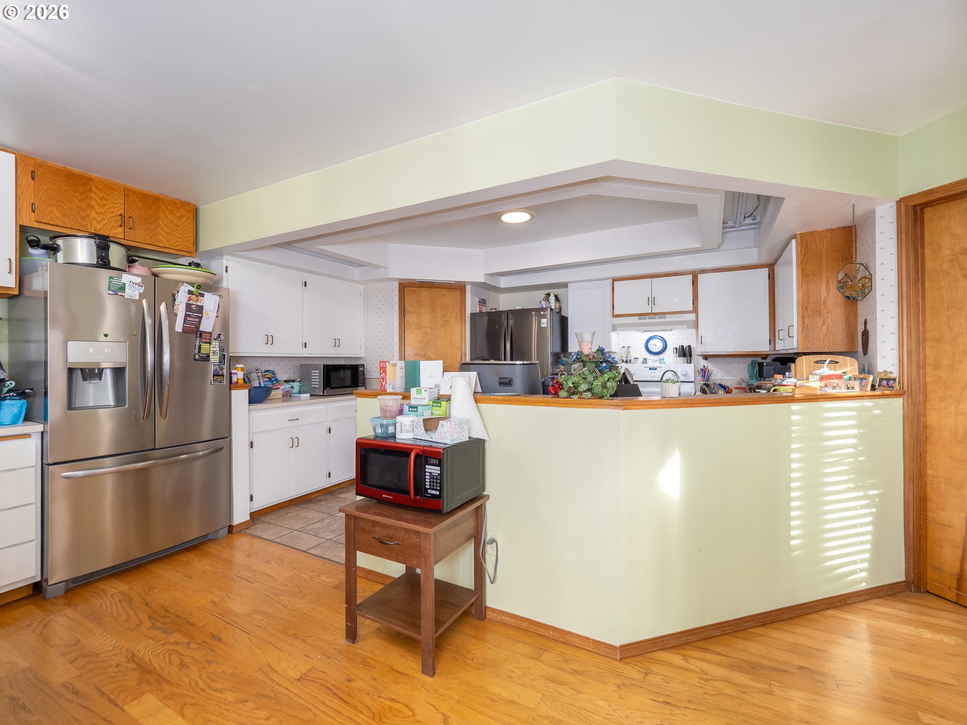 600 Wynooski Street Newberg, OR 97132 - Photo 44 of 48 a kitchen with stainless steel appliances a refrigerator and a stove top oven