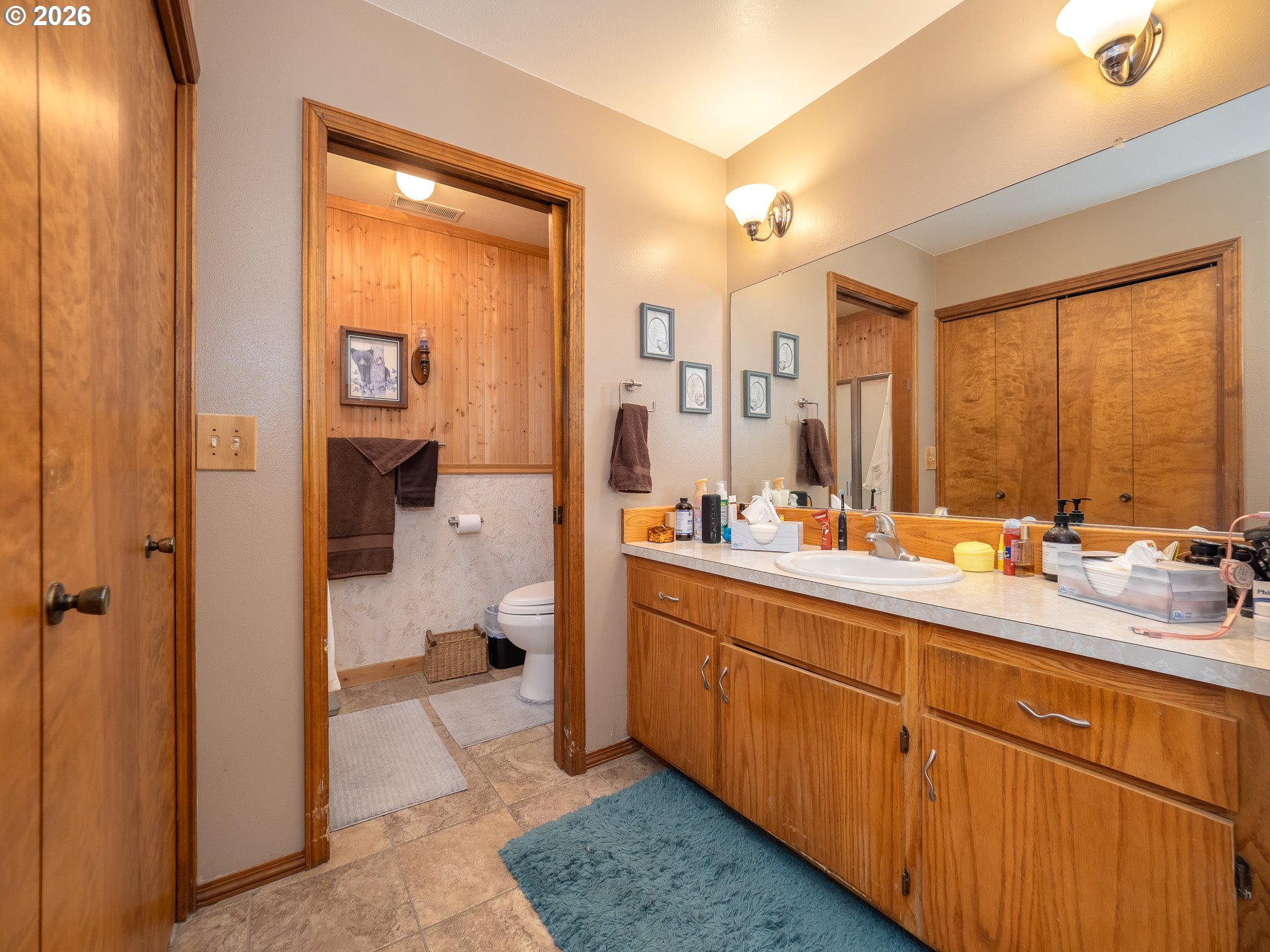 600 Wynooski Street Newberg, OR 97132 - Photo 48 of 48 a spacious bathroom with a double vanity sink a mirror and a shower