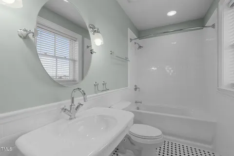 a view of an empty room and closet area