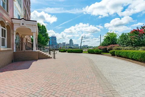 a front view of a building with glass windows