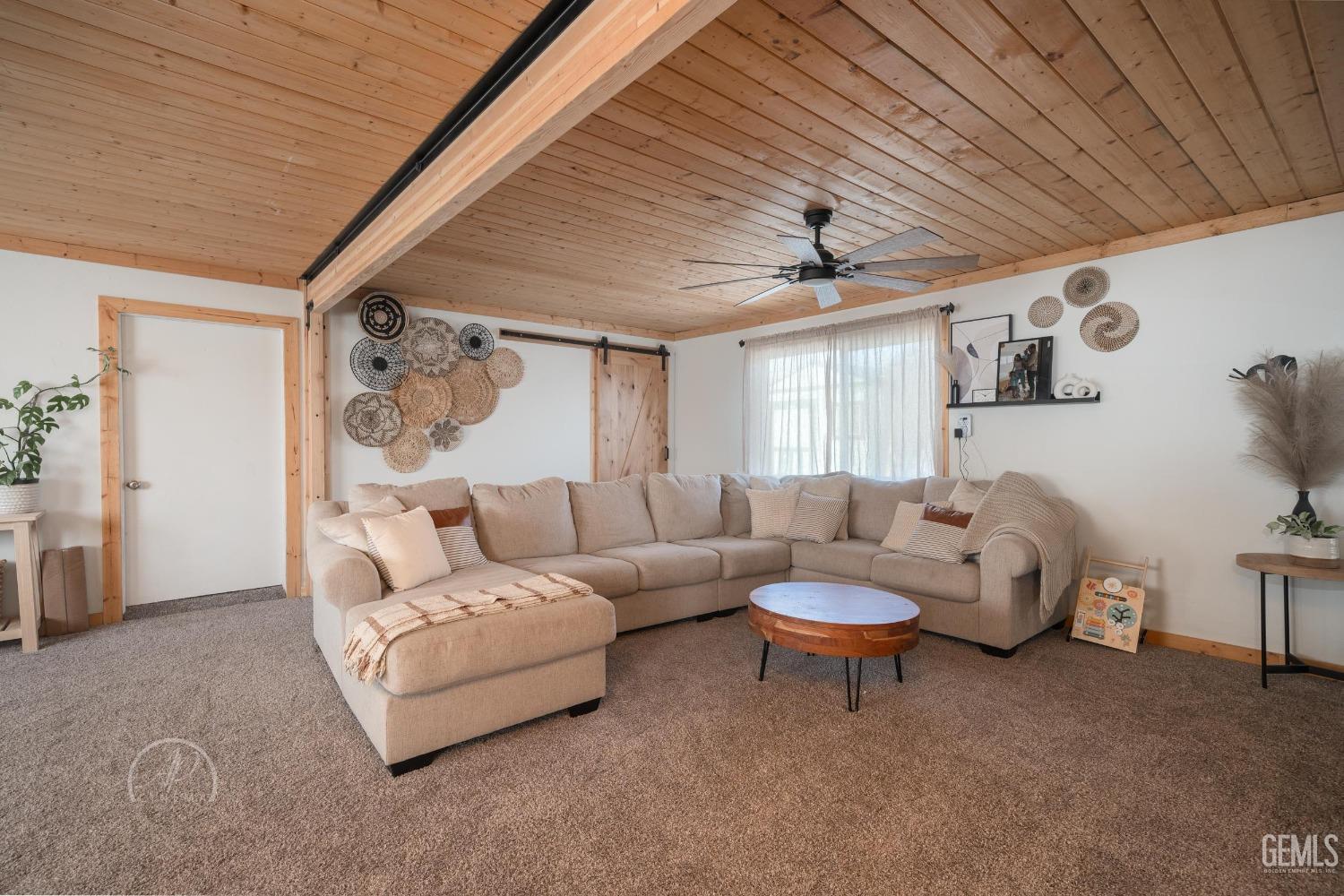 Undisclosed Address New Cuyama, CA 93254 - Photo 11 of 28 a living room with furniture and a ceiling fan