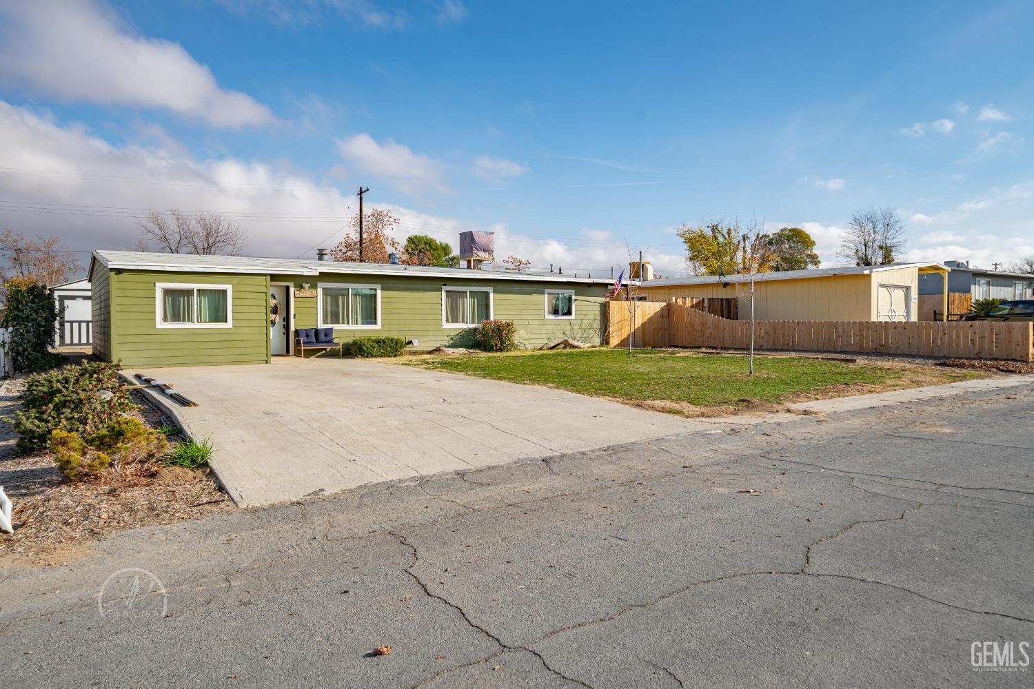 Undisclosed Address New Cuyama, CA 93254 - Photo 2 of 28 front view of a house with a yard