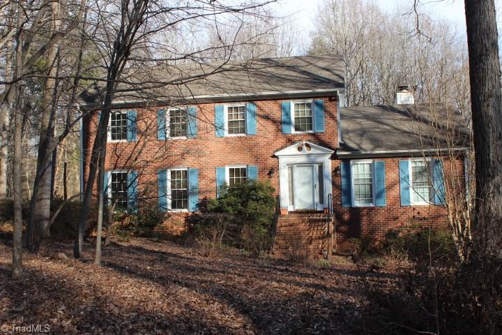 4804 Sweetbriar Road Greensboro, NC 27455 - Photo 1 of 14 Large lot with natural landscaping