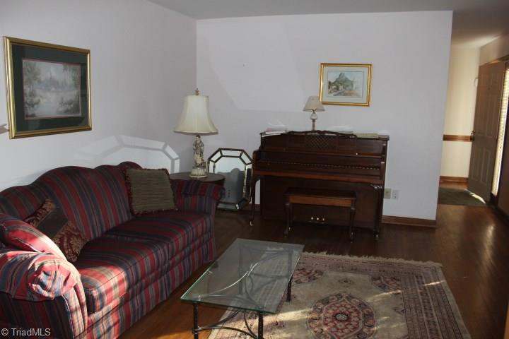4804 Sweetbriar Road Greensboro, NC 27455 - Photo 12 of 14 Formal living room off front entry - could be used as office - original hardwoods