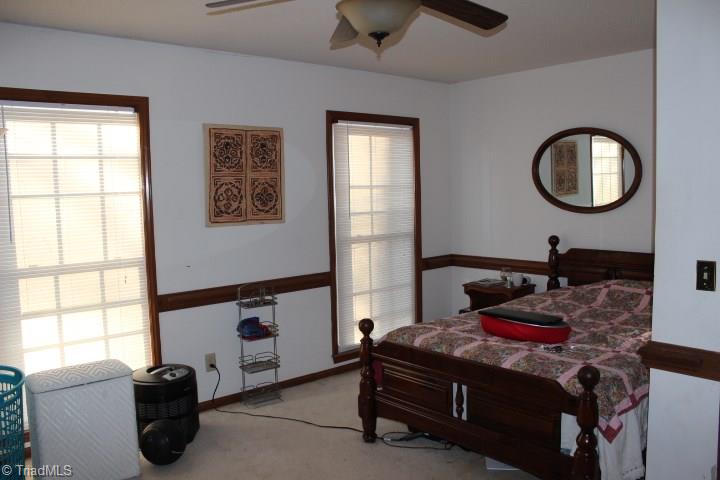 4804 Sweetbriar Road Greensboro, NC 27455 - Photo 5 of 14 Downstairs bedroom and full bath could be used as master.