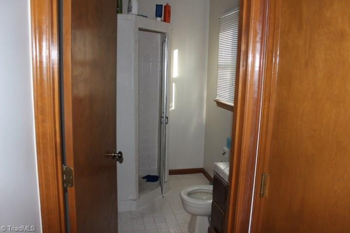 4804 Sweetbriar Road Greensboro, NC 27455 - Photo 6 of 14 Downstairs full bath with shower.