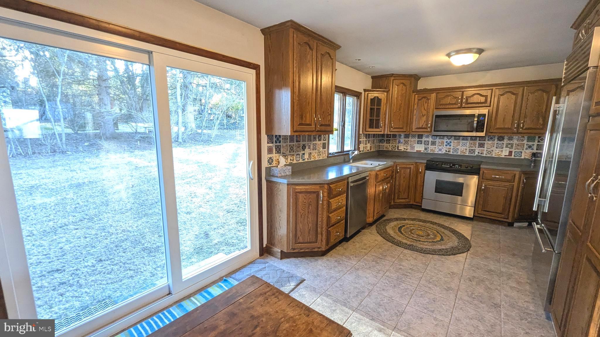429 Simpson Street Bellefonte, PA 16823 - Photo 13 of 27 a view of a kitchen with washer and dryer