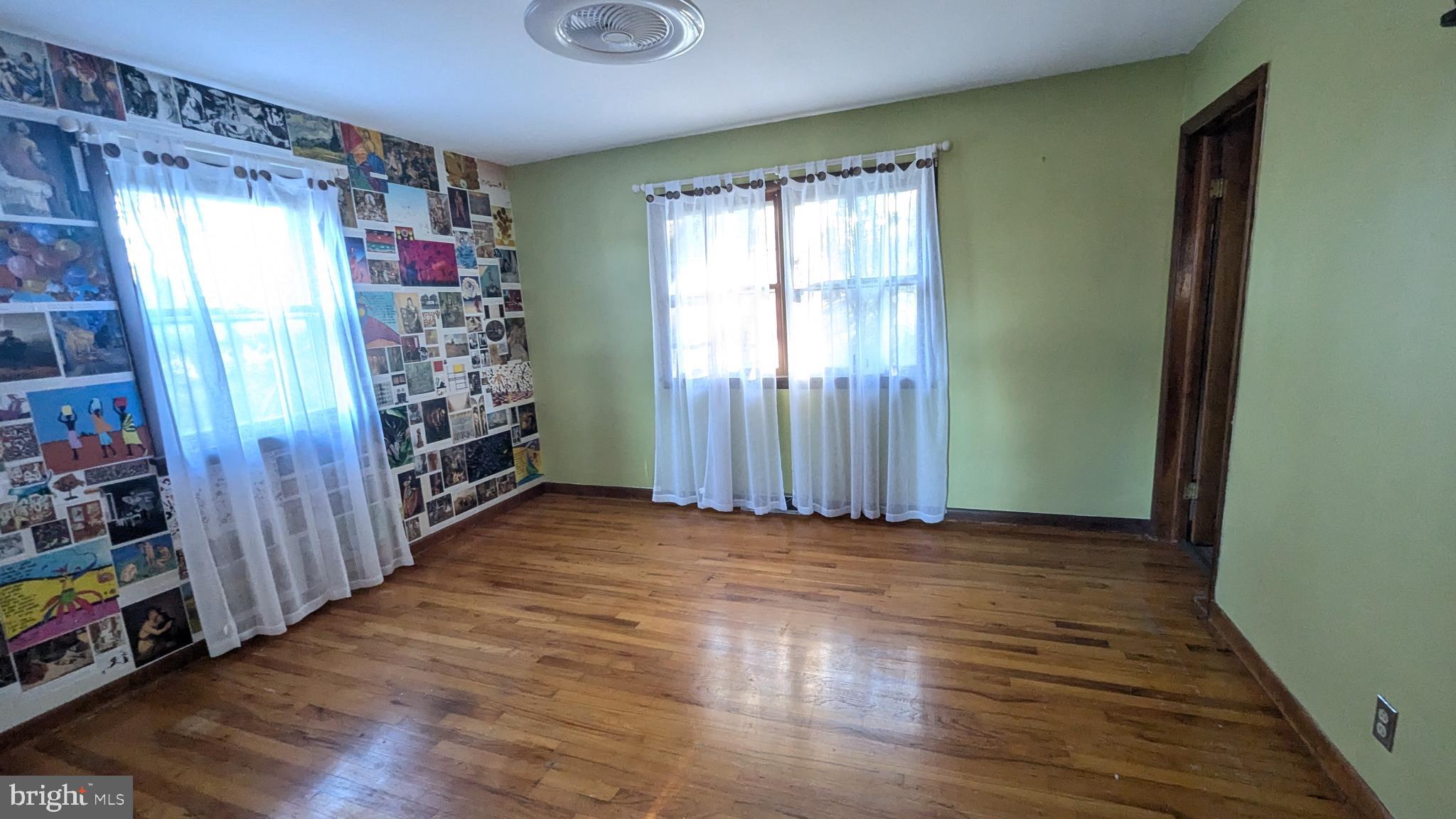429 Simpson Street Bellefonte, PA 16823 - Photo 19 of 27 a view of entryway with stairs and wooden floor