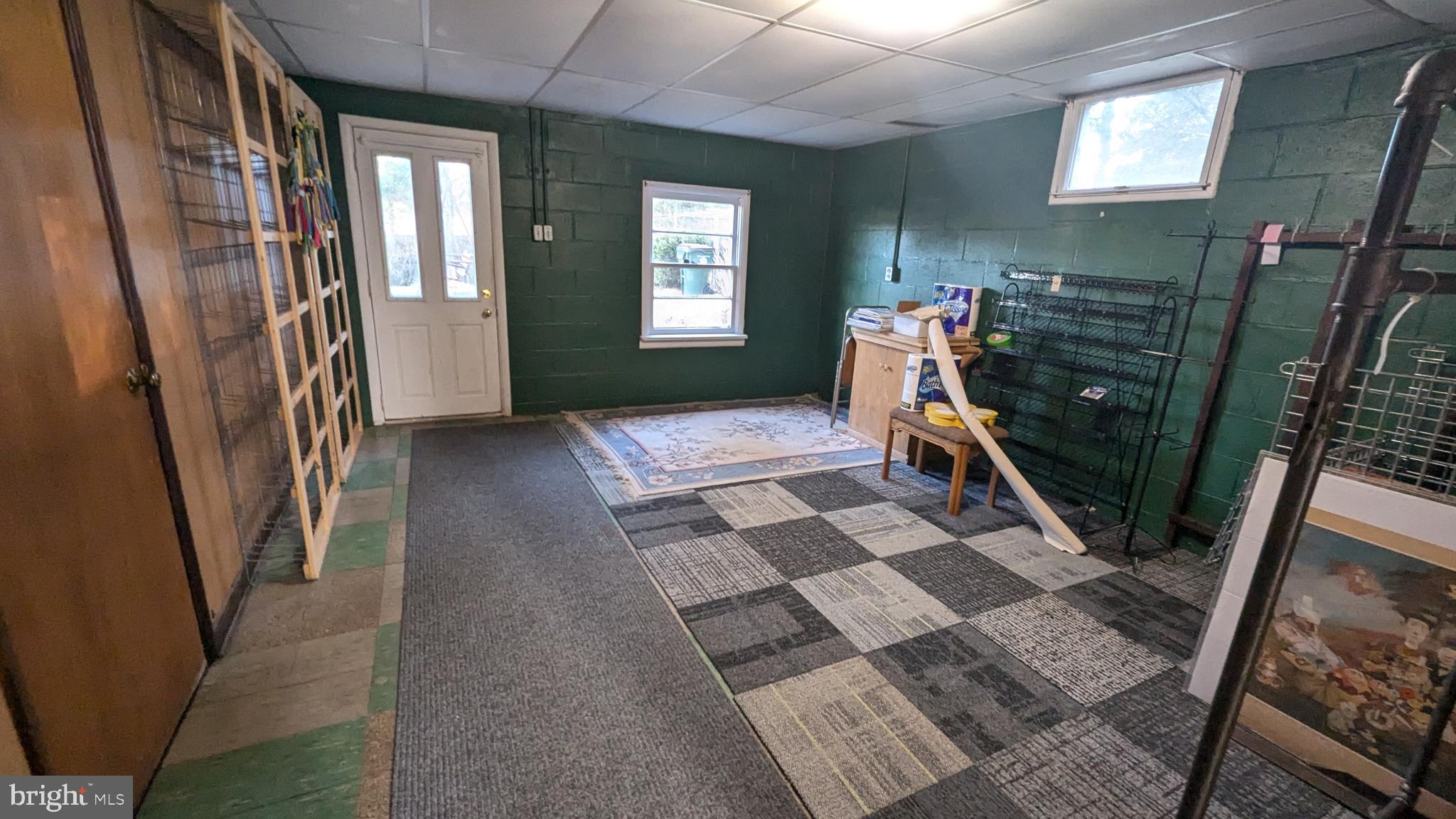 429 Simpson Street Bellefonte, PA 16823 - Photo 26 of 27 a view of a entryway door with living room and furniture